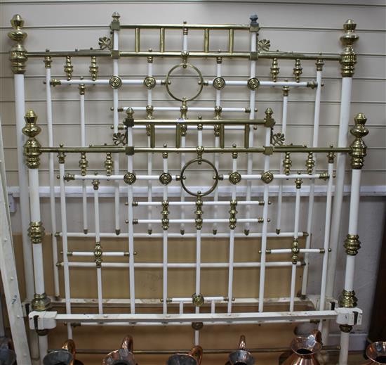 A late Victorian painted metal and brass mounted bedstead, with side irons, W.138cm H.160cm